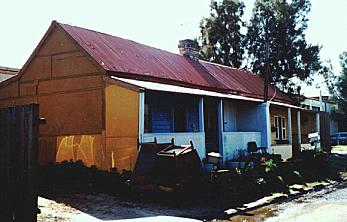 Two of the last three cottages of the Booralee Street fishing village, Botany.  