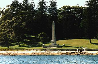 Holt's obelisk and the Isaac Smith memorial on 'Cook's Rock' (circled), 1999. Daphne Salt