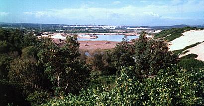 Formerly the site of the towering sand dunes, this area is now deep ponds and valleys, with only a few remnant foredunes as protection against breakthrough by the sea, 1999.