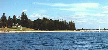 Cook's landing place photographed in 1999 from where the Endeavour lay at anchor. Alpha House and the refinery wharf are seen on opposite sides of the photograph. 