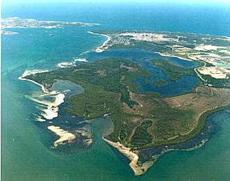 Aerial view of Towra Point. Kurnell Village and Caltex are in the background, sandmining can be seen to the right. (Photo: Sutherland Shire Environment Centre)